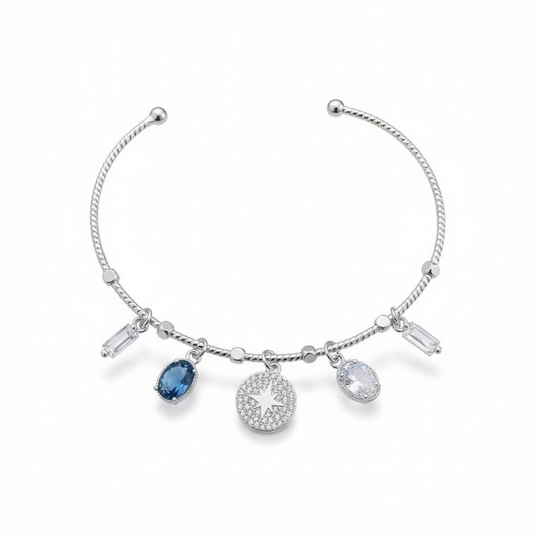 Boréale Charm Bangle — silver-tone open bangle with north star medallion and blue crystals