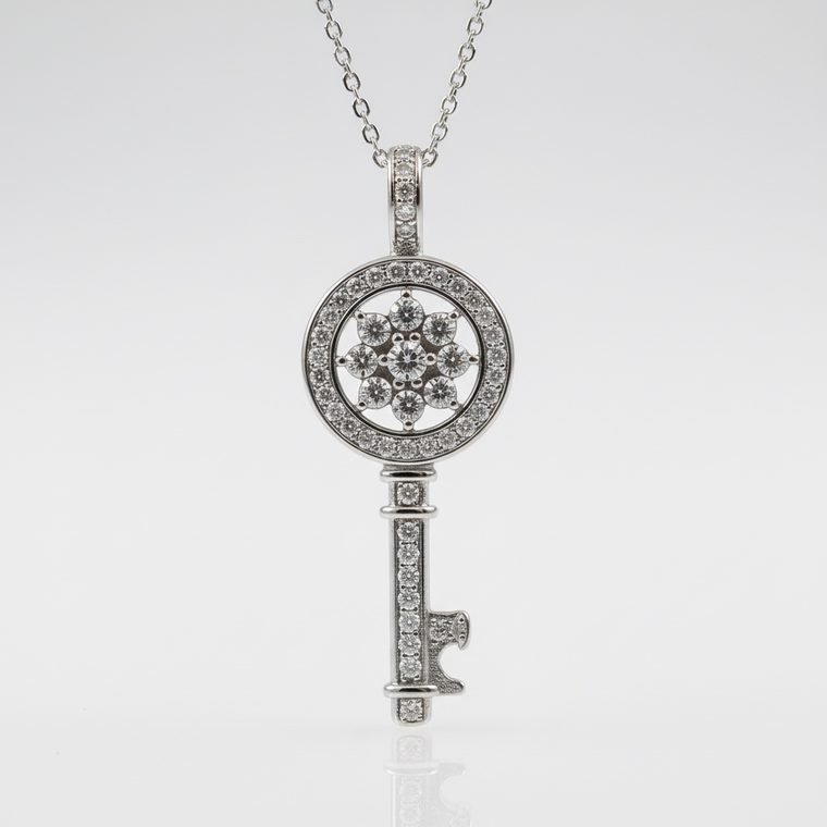 Clé Pavé Key — silver-tone key pendant necklace with pavé zirconia, front view